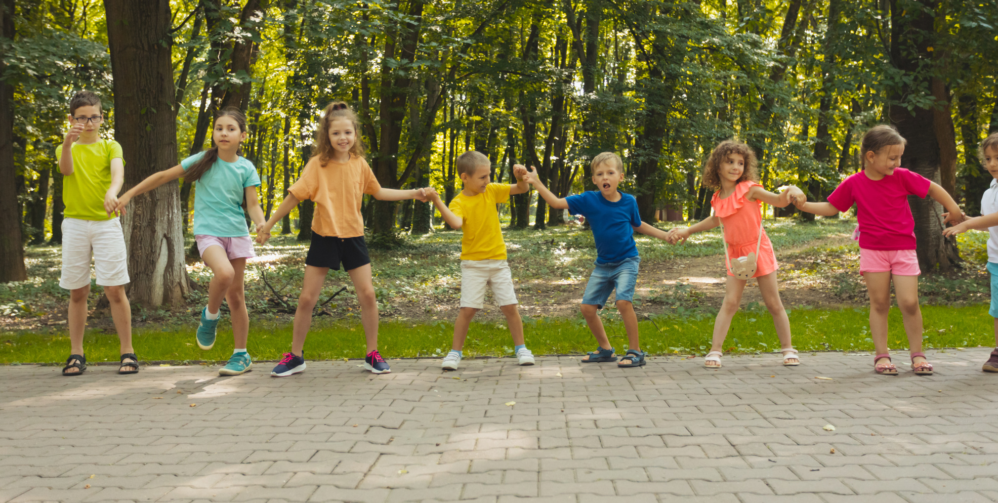 Lovely Children Playing Outdoors at Summer Camp